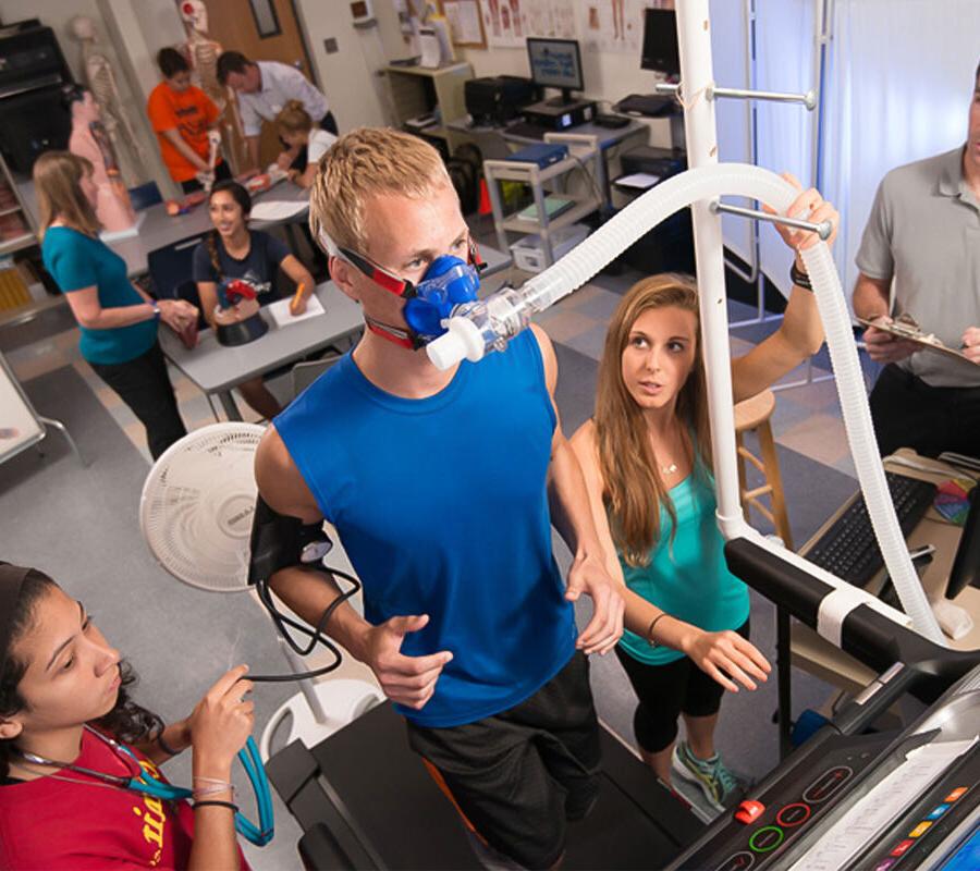 Students from the exercise science program gather data in a lab session.